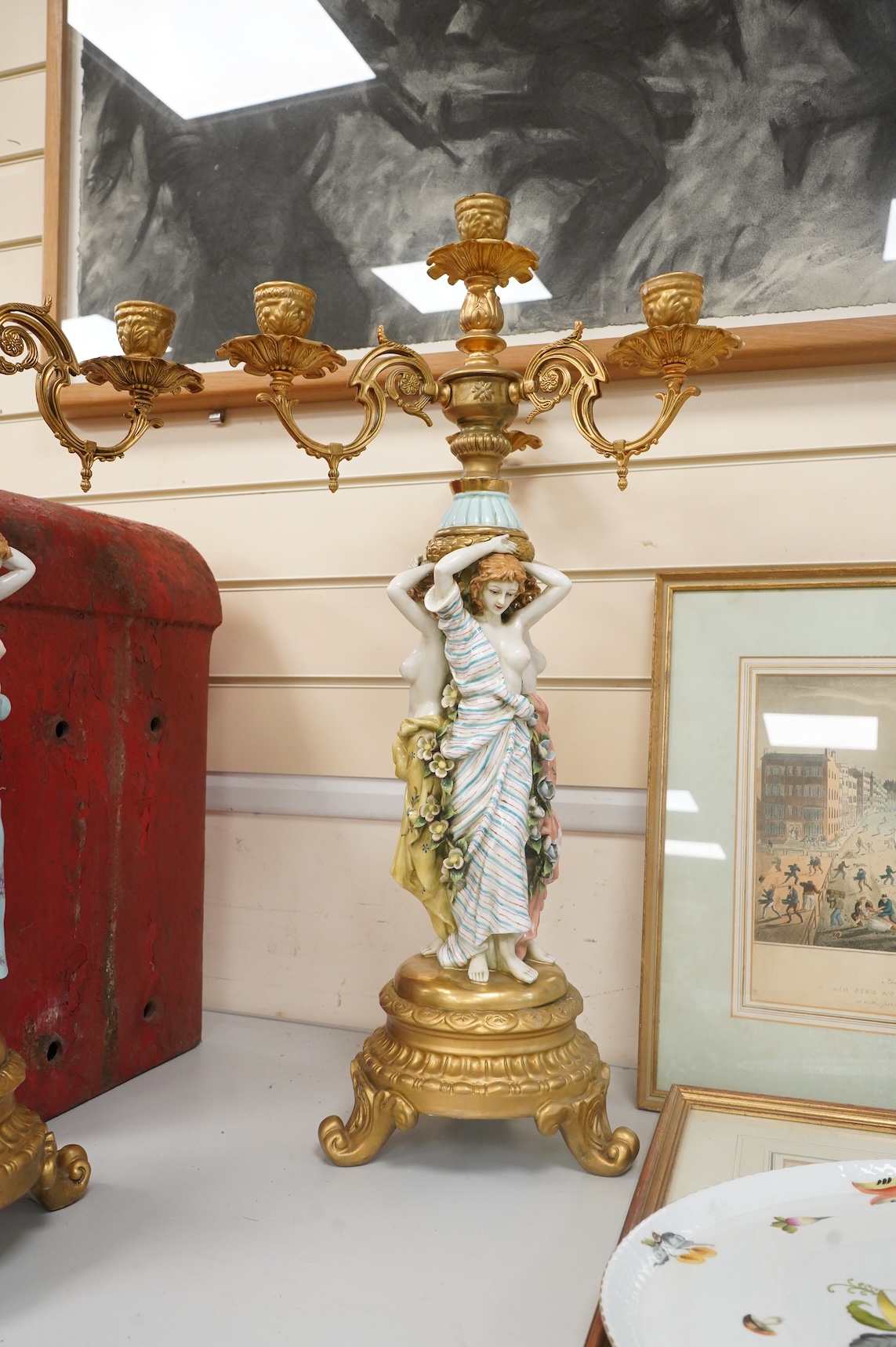 A pair of mid 20th century Italian porcelain and gilt metal mounted figural candelabra- 69cm high
